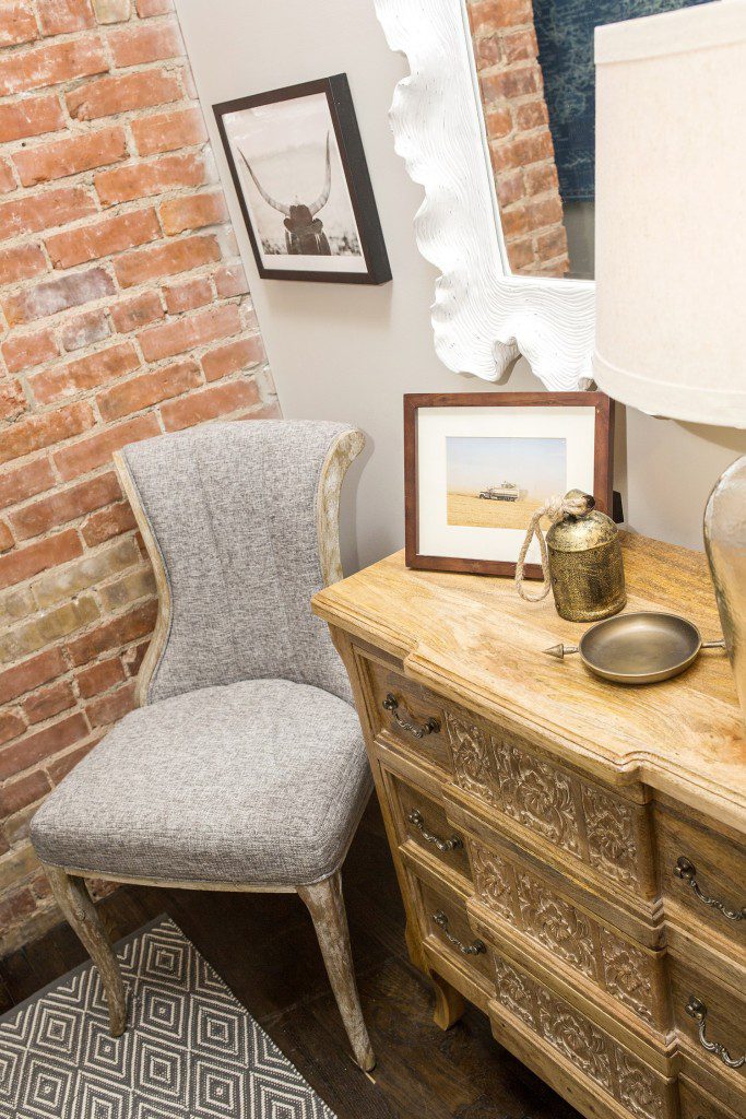 A table with a vase of flowers on it