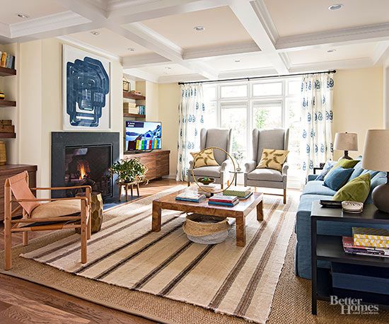 A living room with a fireplace and a couch