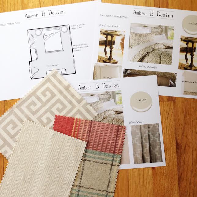 A table with some fabric samples and a plan