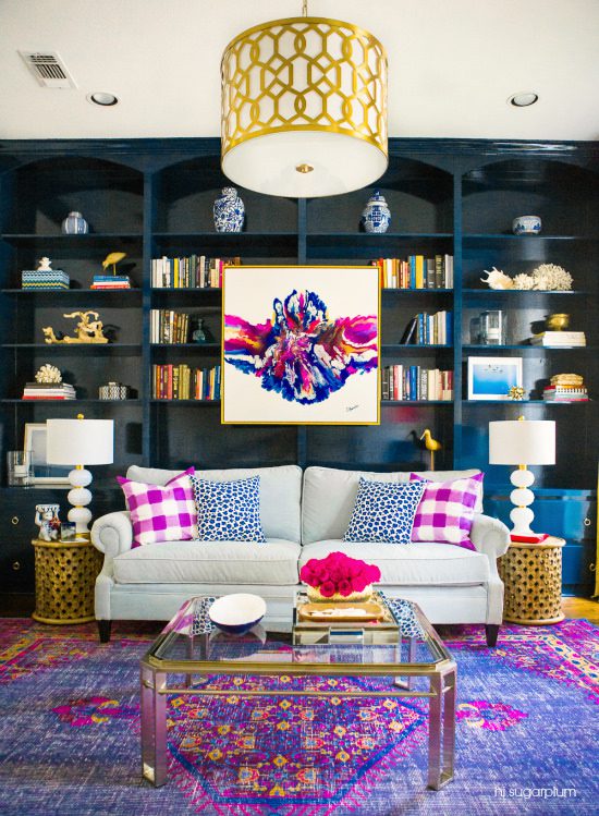 A living room with a couch and table