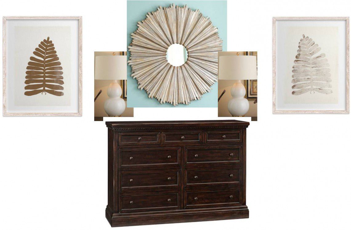 A dresser with two lamps and three pictures