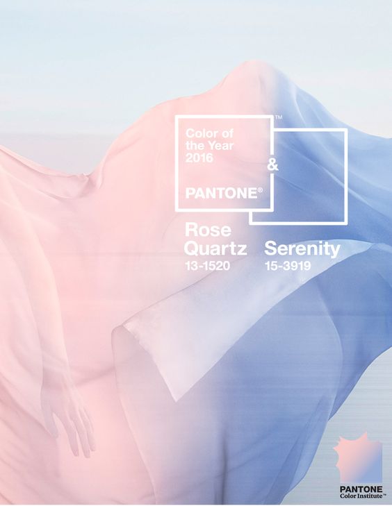 A person standing in front of a window with a rose quartz and serenity color scheme.
