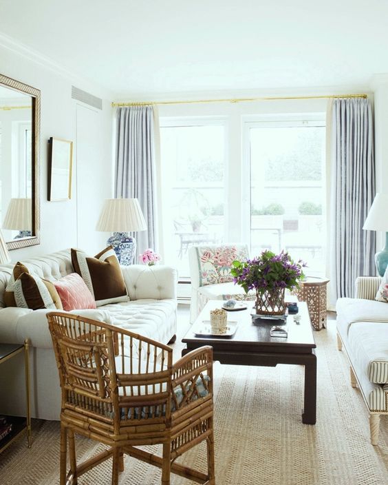 A living room with white walls and furniture.