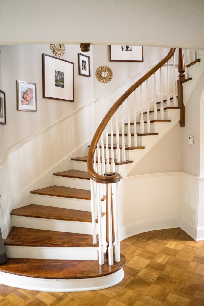 A staircase with wood treads and white risers.