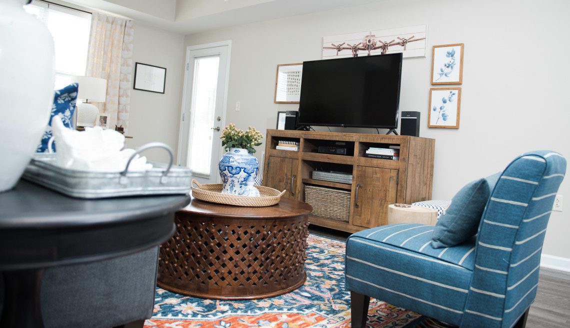 A living room with a tv and a couch